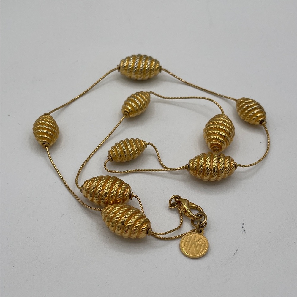 4.15.26-7 Anne Klein Gold-Tone Ribbed Bead Necklace